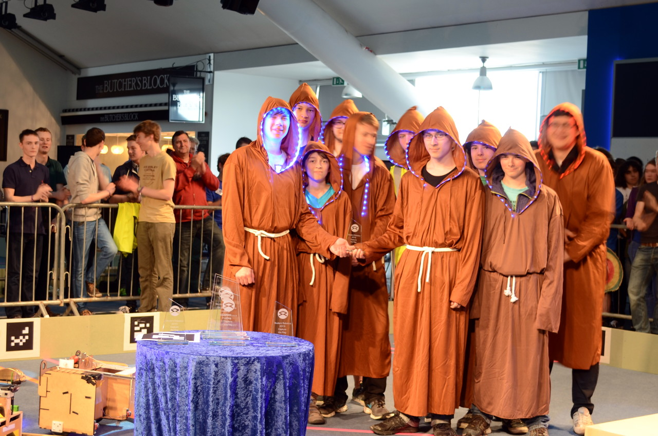 2015 - MAI: “42 * 2 - Double Vision” from Gymnasium Markt Indersdorf,
came dressed as monks in hooded brown robes, laced with glowing LED strips.
