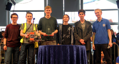 This year's winners, RGS Guildford, holding their trophy and their robot