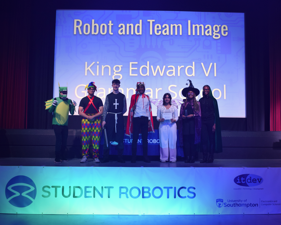 King Edward VI Grammar School with their themed robot and their team in medieval costumes.